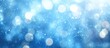 © Cyber Shutter - Stunning bokeh blue water background with shimmering light circles creating a dreamy and soothing visual atmosphere for design projects