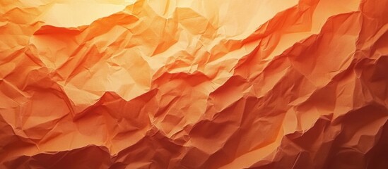 Wall Mural - Textured orange abstract background with crumpled paper effect creating depth and warmth in design elements.