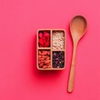 © Ryzhkov - Minimalist Culinary Display Wooden Compartments with Superfoods on Bold Red - Wellness Content and Innovative Meal Planning for Health-Conscious Consumers