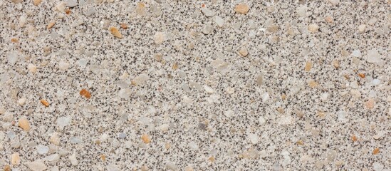 Sticker - Natural sand texture background with varied grains and subtle colors ideal for design projects and creative applications.