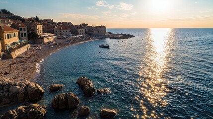 Canvas Print - Golden Hour Sunset Over Adriatic Coastline Beach Rocks and Buildings