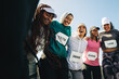 © Jacob Lund - Women embracing friendship after marathon race victory