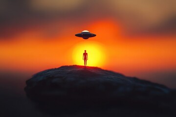 Wall Mural - a person standing on a rocky outcropping with a flying saucer visible in the sky