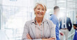 © David/peopleimages.com - Portrait, mature or happy woman with confidence at hospital for medical organization or campaign. Female person, board director or healthcare manager with smile or arms crossed for health development