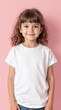© Natalia - Little girl in white shirt on the pastel pink background