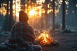 © Yuliya - Chopping Firewood by Campfire with Family in Autumn Forest