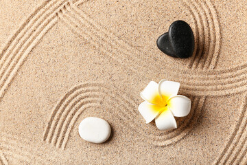 Wall Mural - Stones and plumeria on sand with lines. Zen concept