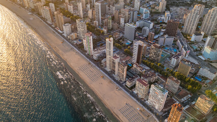 Wall Mural - Aerial view of the Benidorm cityscape at sunset, Costa Blanca, Spain