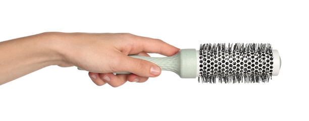 Wall Mural - Woman with round hair brush on white background, closeup