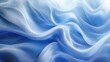 © darion - Soft blue fabric drapes creating a serene, flowing texture.