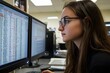 © Anusa - Data Analyst Examining Healthcare Information on Multiple Screens