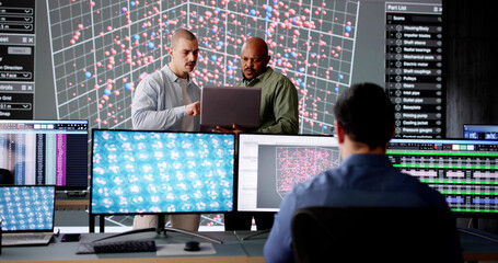 Poster - Diverse cyber team in control room monitoring data