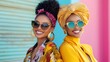 © netrun78 - Young women enjoying a joyful moment while taking a selfie in a colorful setting outdoors