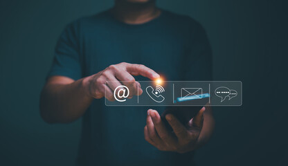 Poster - Customer support hotline people connect or contact us, Concept of using mobile app technology to contact customers. Businessman holding smartphone with icon live chat, email, telephone and address.