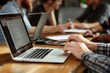 © Artlog Studio - Teamwork and Collaboration: A Close-Up of Hands on Laptop During a Productive Meeting