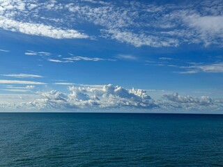 Wall Mural - Blue sea and beautiful heaven clouds.