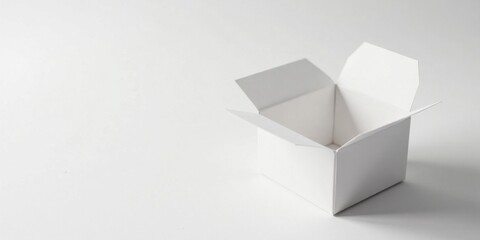 Poster - A pristine, empty white cardboard box sits open on a minimalist, bright white surface, awaiting its contents.
