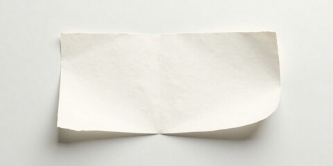 Aufkleber - A Single Sheet of Off-White Paper with a Gently Curled Edge, Resting on a Plain Background, Ready for Your Message