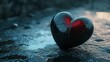 © Devian Art - A heart-shaped stone rests on a black sand beach, surrounded by other smooth stones.