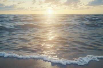 Canvas Print - Sunset over the calm ocean waves at a sandy beach