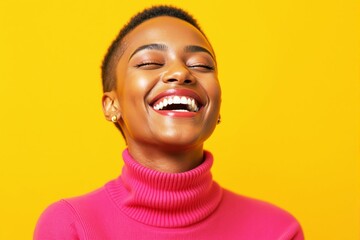 Wall Mural - Radiant woman smiling joyfully against vibrant yellow background.