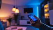 © adha - Smart Home Control: Person Adjusting Interior Lighting with Smartphone App