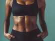 © Сергей Дудиков - Sporty girl with muscular abs posing on a monochrome background. Background for bodybuilding, fitness and other sports that support the figure.