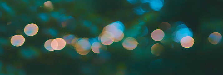 Fototapete - Soft bokeh circles create a dreamy blurred forest foliage effect in bright background
