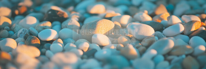 Fototapete - Blurred texture of pebbles on beach creating a soothing bokeh effect