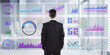 © Who is Danny - Businessman analyzing financial data charts on virtual screen.