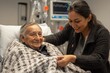 © itchaznong - Nurturing care for elderly patient hospital room emotional moment indoor close-up compassion