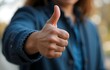 © Arunima Srivastava - Businesswoman giving thumbs up, woman giving thumbs up gesture, female hand's giving thumbs up gesture
