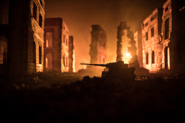 Wall Mural - War Concept. Military silhouettes fighting scene on war fog sky background, World War Soldiers Silhouette Below Cloudy Skyline At night. Battle in ruined city.