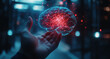 © JuliaArnhem - A man holds in his hand the hologram of an open brain with neural connections, a concept on a business background, in a futuristic style, with a blurred background