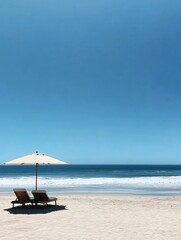 Fototapete - Relaxing at a minimalistic beach with lounge chairs and gentle ocean waves under a clear blue sky. Generative AI