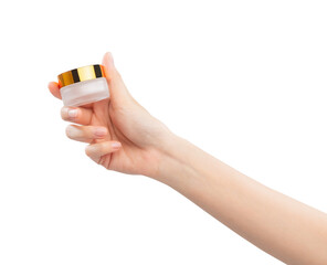 Wall Mural - Hands holding cream product, blank white plastic cosmetic tube on background. Mockup of packaging.