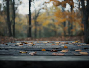 Wall Mural - Autumnal Serenity, Fallen Leaves Adorn a Rustic Wooden Surface in a Misty Forest, Evoking a Sense of Calmness and the Beauty of the Changing Seasons