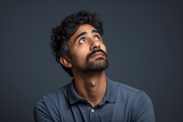 Wall Mural - Indian man portrait looking adult.