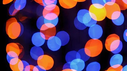 Aufkleber - Bokeh lights with vibrant orange and blue circles, abstract festive concept