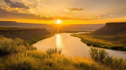 Poster - Golden hour sunlight bathes the river canyon landscape in warm light with cliffs and grass