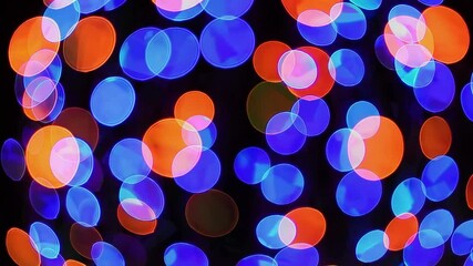 Aufkleber - Vibrant circular bokeh lights in blue and orange shades, abstract background. Festive and colorful lighting concept