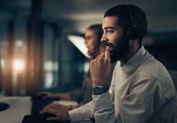 Poster - Night, man and woman in callcenter with phone call, coworking space and teamwork at help desk. Virtual assistant, consultant or customer service agent with headset, online support or advice in office