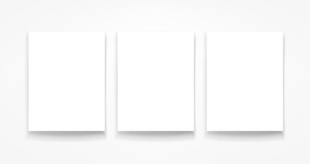 Poster - Three blank portrait frames on the wall. 3d vector mockup