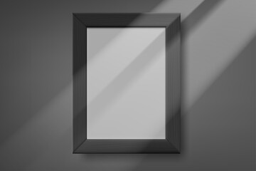Poster - Black photo frame on dark wall with sun ray