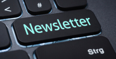 Wall Mural - illuminated keyboard with a labeled key - newsletter