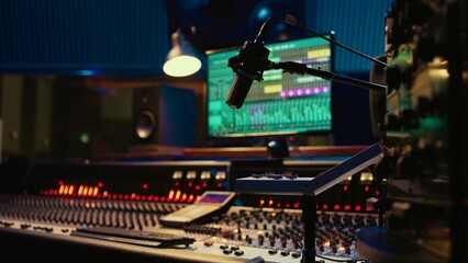 Fototapete - Music recording studio control room with pre amp knobs used for volume level adjustments. Stereo equipment as equalizer, mixer, switchers and sliders are operated in post production.