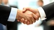 © felix_brönnimann - Handshake between business partners in office signaling agreement, collaboration, and partnership development for successful corporate negotiations and networking.