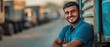 © felix_brönnimann - Smiling young man standing confidently by truck in outdoor setting, showcasing a vibrant atmosphere of transportation, logistics, and teamwork in urban environment.
