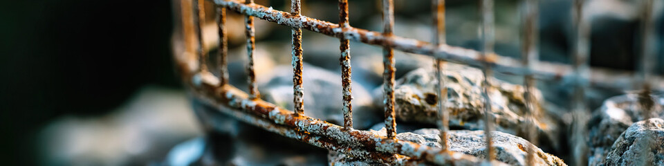 Rusty Metal Grid with Grey Stones