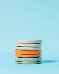 Poster - Ceramic Stack on Aqua Background Modern Minimalist Design for Contemporary Interiors - Versatile Home Decor and Styled Product